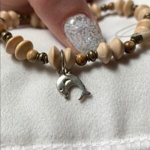 NWT Wooden dolphin bracelet